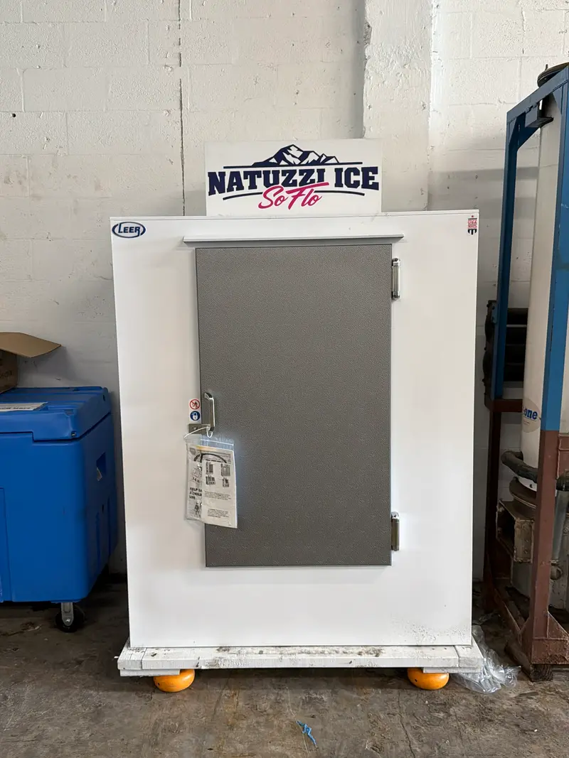 Compact ice merchandiser with a Natuzzi Ice SoFlo sign on top